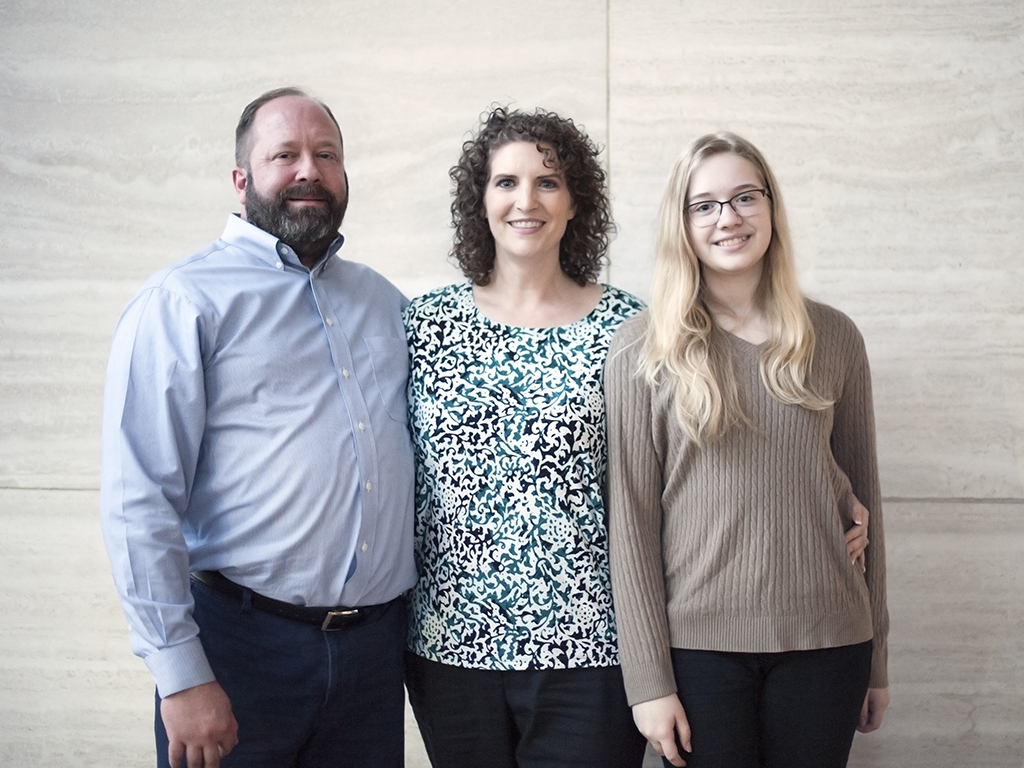 Amy Robison, husband & daughter 